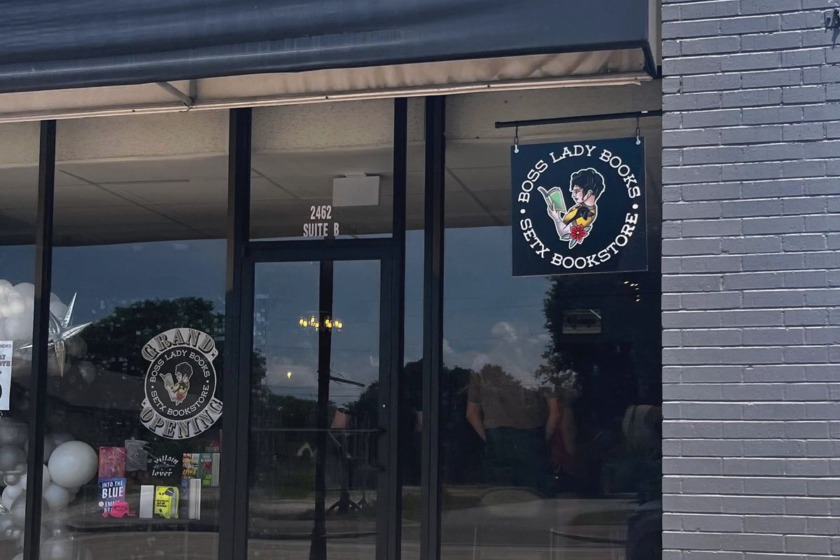 Boss Lady Books storefront at 2462 Calder Ave Suite B in Beaumont, with its hanging sign and grand opening window decal