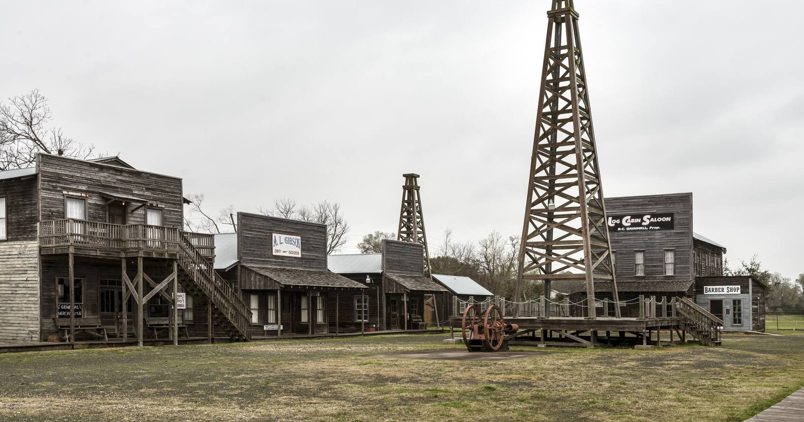 Wooden storefronts and oil derricks at the Spindletop-Gladys City Boomtown Museum in Beaumont
