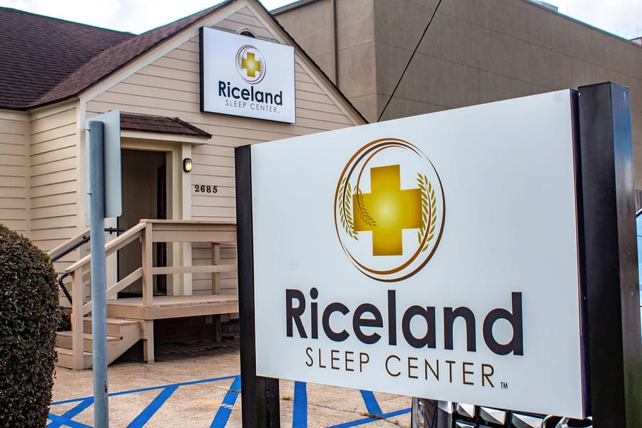 The Riceland Sleep Center monument sign in front of the tan building at 2685 Broadway, Beaumont